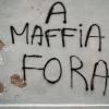 An eine Hausmauer in der korsischen Küstenstadt Bastia steht auf Korsisch geschrieben «Mafia raus».
