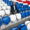 Joachim Herrmann (CSU), Bayerns Staatsminister des Innern, für Sport und Integration, sitzt nach der Medienrunde zum Thema Sicherheit bei Fußballspielen in der Allianz Arena auf der Tribüne. Der Minister gab den Startschuss.