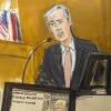 Trumps Ex-Anwalt Michael Cohen im Zeugenstand zu sehen, während eine Titelgeschichte des National Enquirer über Trump auf einem Bildschirm im Strafgericht in Manhattan gezeigt wird.