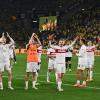 Die Spieler des VfB Stuttgart feiern den Sieg bei Borussia Dortmund.