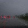 Autos sind während heftigen Regens auf der Autobahn 93 (A93) zu sehen.
