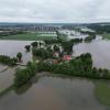 Fünf Minuten nachdem Erna Roppel und ihre Tochter Marie Knauer ihr Zuhause verlassen haben, wurde der Allmannshofener Ortsteil Hahnenweiler überflutet. Das Luftbild zeigt die dramatische Situation.