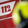«112» steht auf einem Einsatzwagen der Feuerwehr.