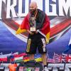Erschöpft, aber überglücklich: Der neue Strongman-Weltmeister Christian Wohlfarth bei der Siegerehrung. Foto: Wohlfarth