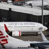 Eine Maschine der Fluggesellschaft Virgin Australia landete in Neuseeland außerplanmäßig. Grund sollen Flammen am Flugzeug gewesen sein.