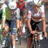 Die Augsburger Georg Zimmermann (links/Team Intermarche-Wanty) und Marco Brenner (Tudor Pro Cycling Team, im Trikot des deutschen Meisters) fahren bei der vierten Etappe der Deutschland-Tour nebeneinander. 