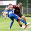 Matthias Fuss (rechts) und der SV Ottmaring setzten sich knapp gegen die Sportfreunde Friedberg II um Davin Wonn durch. 