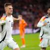 Mit einer «Gammelvorlage» bereitete Deniz Undav (r) den Treffer von Kapitän Joshua Kimmich (l) zur 2:1-Führung vor.