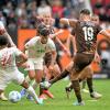 Bis zum Schluss musste der FC Augsburg, hier mit Jeffrey Gouweleeuw, Henri Koudossou und Maximilian Bauer (von links) gegen Andreas Albers und den FC St. Pauli kämpfen.