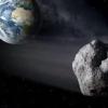 Ein Asteroid wird vom 29. September bis zum 25. November auf einer hufeisenförmigen Bahn die Erde begleiten. (Illustration)