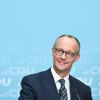 Friedrich Merz, Vorsitzender der CDU, lacht während einer Pressekonferenz der CDU.