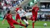 DFB-Pokal 2018: Ante Rebic von Eintracht Frankfurt erzielt den Treffer zum 0:1 neben den Bayernspielern Niklas Süle (r.) und Mats Hummels. Die offene Rechnung mit der Eintracht nach der 1:3 Niederlage haben sie beim FC Bayern nicht vergessen.