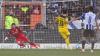 Bielefelds Torwart Stefan Ortega (l) kassiert den Treffer zum 0:1 per Elfmeter durch Dortmunds Torschützen Emre Can.