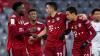 FC Bayern gewinnt: Alphonso Davies (l-r), Kingsley Coman, Marc Roca und Torschütze Jamal Musiala von München jubeln über das Tor zum 2:1. Foto: