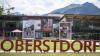Vor dem Oberstdorf-Haus weisen großformatige Aufnahmen aus dem Zyklus „Heimat“ von Friedrun Reinhold auf den „Oberstdorfer Fotogipfel“ hin.