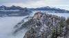 Blick auf den Falkenstein bei Pfronten. mit der Burgruine auf der Spitze und dem Burghotel rechts daneben. Im Tal hängt der Nebel. Blick auf den Falkenstein bei Pfronten. mit der Burgruine auf der Spitze und dem Burghotel rechts daneben. Im Tal hängt der Nebel.