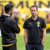 BVB-Boss Lars Ricken diskutiert nicht über Trainer Nuri Sahin (links)