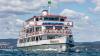 Ab Sonntag, 10. April 2022, sind die Schiffe der Vereinigten Schifffahrtsunternehmen für den Bodensee und Rhein (VSU) wieder auf dem gesamten Bodensee unterwegs. Nachdem sich der Saisonstart in den letzten zwei Jahren aufgrund der Corona-Pandemie verzögert hatte, ist in diesem Jahr einer Pressemitteilung der VSU zufolge erstmals wieder ein pünktlicher Start möglich. "Wir freuen uns, nach einem langen Winter endlich wieder Leben auf den See zu bringen und gerade in diesen für alle schwierigen Zeiten ein Stück Lebensfreude bieten zu können", so VSU-Vorsitzender Frank Weber.
Corona war auch hier spürbarAlle Schifffahrtsunternehmen haben die Auswirkungen der Pandemie in den letzten beiden Jahren deutlich zu spüren bekommen: "Hinsichtlich der Fahrgastzahlen waren 2020 und 2021 nicht mit einem normalen Jahr vergleichbar. Aufgrund des verspäteten Saisonstarts gingen wichtige Fahrtage verloren, dazu kamen längere Phasen mit schlechtem Wetter. Dadurch konnten wir zusammen zwar 2.287.460 Passagiere und damit rund neun Prozent mehr Fahrgäste als im Vorjahr an Bord begrüßen, was jedoch deutlich unter den Fahrgastzahlen der Jahre vor der Pandemie liegt", so die Bilanz von Frank Weber. "Das hatte auf uns alle natürlich auch finanzielle Auswirkungen, die wir so gut es ging abgefedert haben. Aber nun blicken wir optimistisch in die Zukunft. Die Buchungszahlen der Beherbergungseinrichtungen sind gut, weshalb wir uns bereits heute sehr auf unsere Gäste freuen, möglichst bei einer Saison ohne große Einschränkungen und mit Kaiserwetter."Es gibt wieder eine FlottensternfahrtEin erster Höhepunkt der Saison ist die 49. Internationale Flottensternfahrt am Samstag, den 30. April. Ziel der Schiffe ist Lindau, wo sie eine Sternformation bilden – ein beeindruckendes Manöver, das nach einem zweimaligen coronabedingten Ausfall, nicht alle Tage zu sehen ist. Dabei wird die grenzübergreifende Freundschaft zwischen Deutschland, Österreich und der Schweiz zelebriert.Das steht diese Saison auf dem ProgrammVom 10. April bis in den Oktober hinein fahren die Schiffe im Kursverkehr nach festem Fahrplan: Von Schaffhausen bis Kreuzlingen, von Konstanz nach Überlingen, von Meersburg nach Lindau und von Romanshorn bis Bregenz lädt die Weiße Flotte dazu ein, den Bodensee und Rhein zu erkunden. In die neue Saison starten die VSU mit diesem Programm: Neben Angeboten wie den Fahrten zu den Bregenzer Festspielen, bei denen in diesem Jahr die Oper "Madame Butterfly" gespielt wird, steht 2022 noch mehr auf dem Programm: Beispielsweiße gibt es kulinarische Fahrten wie den Osterbrunch, den Enten-Schmaus oder das Bayerische Frühstück. Neu ist in der Saison 2022 auch das gemeinsam mit "Maestrani Chocolaneum" angebotene Schoki-Schiff, bei dem Kinder Schokistängel verzieren und Schokolade in ihren unterschiedlichen Formen kennenlernen können. Ab dem Sommer wird zudem das erste Elektroschiff der BSB auf dem Überlinger See zwischen der Insel Mainau, Unteruhldingen und Meersburg verkehren – es stellt den Auftakt des Vorhabens dar, die BSB-Flotte bis 2035 klimaneutral fahren zu lassen. Programm der österreichischen Vorarlberg LinesDie österreichischen Vorarlberg Lines (VLB) bieten in dieser Saison ebenfalls wieder ein Programm an: Bei einer dreitägigen Kreuzfahrt am Bodensee mit neuen Routen erleben die Gäste den Bodensee von einer neuen Seite. Auf dem Eventschiff MS "Sonnenkönigin" gibt es Premiumfahrten zu verschiedenen Anlässen wie etwa Sonnenkönigin meets Schlager, dem Sommernachtsball der Königin, oder dem Captain’s Brunch. Außerdem läuft das Grill-Schiff deluxe wieder aus und es gibt auf dem Bodensee ein Krimidinner mit dem Namen "Viva la Muerte – Es lebe der Tod!" sowie ein Dinner-Musical mit dem Titel "The Musical Sound of Female Power".Programm der schweizerischen Bodensee SchifffahrtBei der Schweizerische Bodensee Schifffahrt (SBS) stehen ebenfalls Themenfahrten an. Die Klassiker wie der wöchentliche Sonntagsbrunch auf dem MS "Säntis" oder der MS "St. Gallen", die Fahrten zum Kreuzlinger Seenachtfest und die Erlebnisrundfahrten Thurgau finden auch in diesem Jahr wieder statt. Nach dem Erfolg der letzten zwei Jahre wird das Strickschiff 2022 drei Mal durchgeführt. Auch die Musikfahrten sowie die Tanz-Schiffe stechen dieses Jahr wieder in See.

Die Schweizerische Schifffahrtsgesellschaft Untersee und Rhein (URh) ist ebenfalls mit mehreren neuen Formaten bereit für die Saison: Im September geht es auf eine Kreuzfahrt mit dem Schauspieler, Maler und Musiker Nagelritz (Dirk Langer). Ausgestattet mit Schifferklavier, Gitarre und jeder Menge Geschichten begleitet er eine Reise auf dem Rhein. Von Mai bis Oktober wird man an jeweils an einem Samstag das Wochenende auf dem "Wii-Schiff" mit einer Reise durch die Weinlandschaft beginnen können. Und das Schiff-Hotel MS "Konstanz" lädt dazu ein, auf dem Schiff zu übernachten.

Nach dem Ende der Kursschifffahrt im Oktober ist die Schifffahrts-Saison am Bodensee allerdings noch nicht vorbei: Im Winter bieten die Unternehmen Herbst-, Advents- und Silvester- Fahrten an.