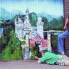 Urlauber schmücken Garagentor mit Neuschwanstein-Ansicht