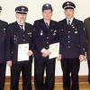 Ehrennadeln in Gold und Silber: Bei der Zusammenkunft der Freiwilligen Feuerwehr der Stadt in Gerlachsheim wurden seitens des Verbandes zwei Mitglieder der Abteilung Marbach besonders gewürdigt; (von links) der Vorsitzende für den Main-Tauber-Kreis, Heinz Bader, Josef Ludwig, Berthold Schäffner, stellvertretender Kreisbrandmeister Elmar Wohlfart und Bürgermeister Thomas Maertens.