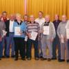 Ehrungen bei der Raiba-Versammlung in Neuhütten: (von links) Winfried Rauch (Prokurist, Raiffeisenbank Lohr), Linus Kunkel (50 Jahre), Rudi Hümpfner, Hermann Kunkel, Ottmar Kunkel (alle 40 Jahre), Heinz Karl (TSV Neuhütten; 50 Jahre), Franz Kunkel, Günther Kunkel (verdeckt), Helene Bauer, Helga Merz, Konrad Englert, Franz Herteux, Alfons Englert (alle 40 Jahre), Alfons Merz, Leo Karl, Fridolin Englert (alle 50 Jahre), Günter Geist (Aufsichtsrat der Raiffeisenbank), Matthias Scheiner (Marktbereichsleiter, Raiffeisenbank Lohr).