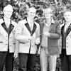 Musikkapelle Poppenhausen unter neuer Leitung: Der musikalische Leiter Ralf Müller übergab den Dirigentenstab an Florian Bauer im Beisein der Vorsitzenden Lorenz Schneider und Norbert Müller.