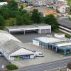 Verkauft haben Wilfried und Helga Grampp ihr Grundstück an drei Brüder in Karlstadt. Die Aral-Tankstelle bleibt. In dem hinteren Gebäudeteil (links) möchten die Brüder für ihre Firma „Best Automobile GbR“ gebrauchte Fahrzeuge bis zum Weiterverkauf zwischenlagern. Der vordere Bereich hin zur Würzburger Straße soll vermietet werden.