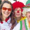 Unterstützen die Läufer mit Down-Syndrom (DS): Anita Kinle (Mitte) vom DS-Laufclub, Pumuckl Dietmar Mücke und Michel Descombes.