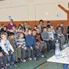 Spannende Vorlesung: Kinderbuchautorin Barbara Rose und die Kinder der Otfried-Preußler-Grundschule in Wertheim-Wartberg.