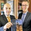 Bissiger Kritiker: Olaf Trebing-Lecost (links) mit Rebstock-Chef Christoph Unckell.