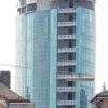Der Unvollendete: Den Grombühlern präsentiert der Hotelturm seit sechs Jahre seine offene Fassaden-Rückseite.