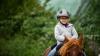 Katrins Tocher reitet gerne. Wenn es möglich ist, macht die Familie Ausflüge auf den Pferdehof mit einer Betreuerin. Katrins Tocher reitet gerne. Wenn es möglich ist, macht die Familie Ausflüge auf den Pferdehof mit einer Betreuerin.