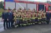 Erfolgreiche Leistungsprüfung: Die Aktiven der Feuerwehr Hafenlohr mit Schiedsrichtern und Bürgermeister Thorsten Schwab.