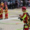 Die Handgriffe sitzen, die Vorführung der Kinder-Feuerwehr ließen sich viele Zuschauer nicht entgehen.