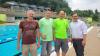 Armin Seufert (Wasserwacht Frammersbach), Michel Menge (Fa. Phplus – Die Bäderpartner), Thomas Ebersbach und Bürgermeister Christian Holzemer (von links) freuen sich auf gute Zusammenarbeit. 