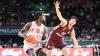 Darius Perry von den Würzburg Baskets im Duell mit Bayern-Aufbauspieler Leandro Bolmaro während des ersten Spiels in München.