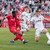 Benjika Caciel (19) von den Würzburger Kickers  im Zweikampf mit Mario Kufner (16) vom DJK Vilzing. Die Würzburger Kickers gewinnen das letzte Heimspiel am Samstag 18.05.24 gegen die DJK Vilzing souverän mit 4:0 in der AKON Arena in Würzburg. Nach dem Spiel werden sie vom BFV zum Regionalliga Meister 2024 geehrt.