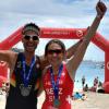 Siegreich als Staffel bei der "Challenge 70.3" auf Gran Canaria: der Esselbacher Johannes Seidenspinner (links) und die Schweizerin Sandrine Benz.