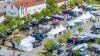 Am Samstag startete in Bad Neustadt die 11. Fahrzeugschau ­Elektromobilität. Auf dem Festplatz gab es, wie dieses Drohnenfoto zeigt, zahlreiche Elektrofahrzeuge zu begutachten. 