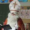 Gespannt hörten die Kinder zu, was der Nikolaus aus seinem Buch vorlas. Gespannt hörten die Kinder zu, was der Nikolaus aus seinem Buch vorlas.