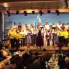 Chöre des Musikalischen Vereins aus Winterhausen zusammen mit "Coro Stella Traffiumese" vom Lago Maggiore beim gemeinsamen Lied: "Amici miei" auf Deutsch und Italienisch.