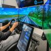 So könnte die Mobilität von morgen aussehen: Nora Merkel vom Würzburger Institut für Verkehrswissenschaften übt auf dem Teststand die Fernsteuerung von autonom fahrenden Lastwagen.
