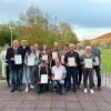 Die Geehrten (von links): Gesellschaftspräsidentin Katharina Baidel Thomas Heilmann, Sitzungspräsident Dieter Dietz, Sandra Hesselbach, Manuel Schmitt, Herbert Moritz, Sina Lippert, Wolfgang Schaub, Michael Reitberger, Gabriele Eberlein, Gerd Faßnacht, Irmgard Straub, Ingrid Mahler und Dieter Straub