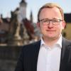 Tilman Schneider, der Pfarrer der evangelischen Kirchengemeinde Thüngen-Arnstein, verkündet die Gründung einer Pfarrei mit der Kirchengemeinde Karlstadt, deren Vakanzvertretung er im September übernehmen wird.