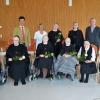 Sitzend von links: Schwester (Sr.) Gunharda Oberle (70 Jahre Profess),  Sr. Klara Straub (65 Jahre), Sr. Lotharia Wald (70 Jahre), Sr. Roberta von der Weiden (70 Jahre), Sr. Magda Lindner (60 Jahre), Sr. Gamalberta Elting (65 Jahre); hinten stehend von links: Verwaltungsleiter Michael Fritsche, Pflegedienstleiterin Astrid Graf, Sr. Birgit Böckler (65 Jahre Profess), die Kommunitätsleiterin des Pflegeheims, Sr. Herigard Schneider und der Hausgeistliche Pfarrer Richard Baunach. Auf dem Foto fehlen: Sr. Gerasina Ruppert (70 Jahre Profess), Sr. Veneranda Löffler (70 Jahre), Sr. Winfrieda Kreutner (65 Jahre), Sr. Laetitia Haßler (60 Jahre) und Sr. Veronika Stauch (60 Jahre).