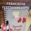 Im Kochbuch "Fränkische Festtagsrezepte", aufgelegt von der Ochsenfurter Kauzen Bräu und dem Bezirk Unterfranken, stehen typisch unterfränkische Rezepte längst vergangener Zeiten. 