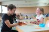 "Brettspiele sind viel cooler als Playstation zu spielen" - die Geschwister Daniel (12) und Lena Langmandel bei einer Partie "Klask".
