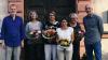 Die Leitungen des Sozialpsychatrischen Diensts übergeben Blumenstrauß und die goldene Caritasnadel (von links): Leitung SpDi Gemünden Michael Gross, Marianne David, Sigrid Hofmann, Margarte Emmert, Michaela Wenig, Leitung SpDi Andreas Mayer.