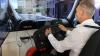 Bürgermeister Horst Herbert steuert einen Feuerwehr-Lkw im Fahrsimulator durch eine Innenstadt. Das ist nicht einfach.