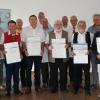 Obermeister Heinz Schuchbauer, stellv. Obermeister Udo Merz und die Geschäftsstellenleiter Josef Bock und Stefan Köppe mit den Geehrten.